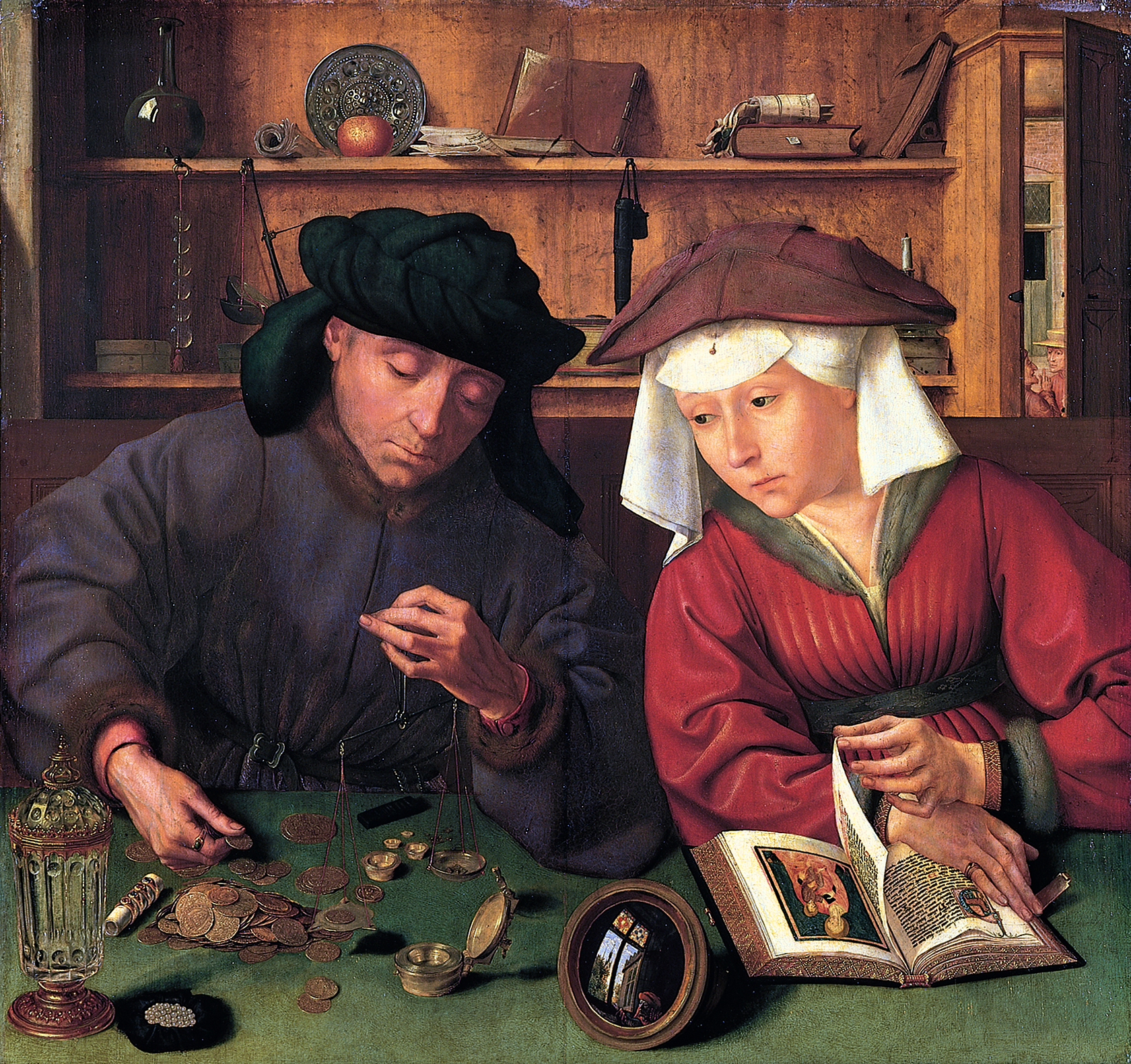 El cambista y su mujer, pintura de Quentin Metsys de 1514, con monedas, una balanza y un libro religioso